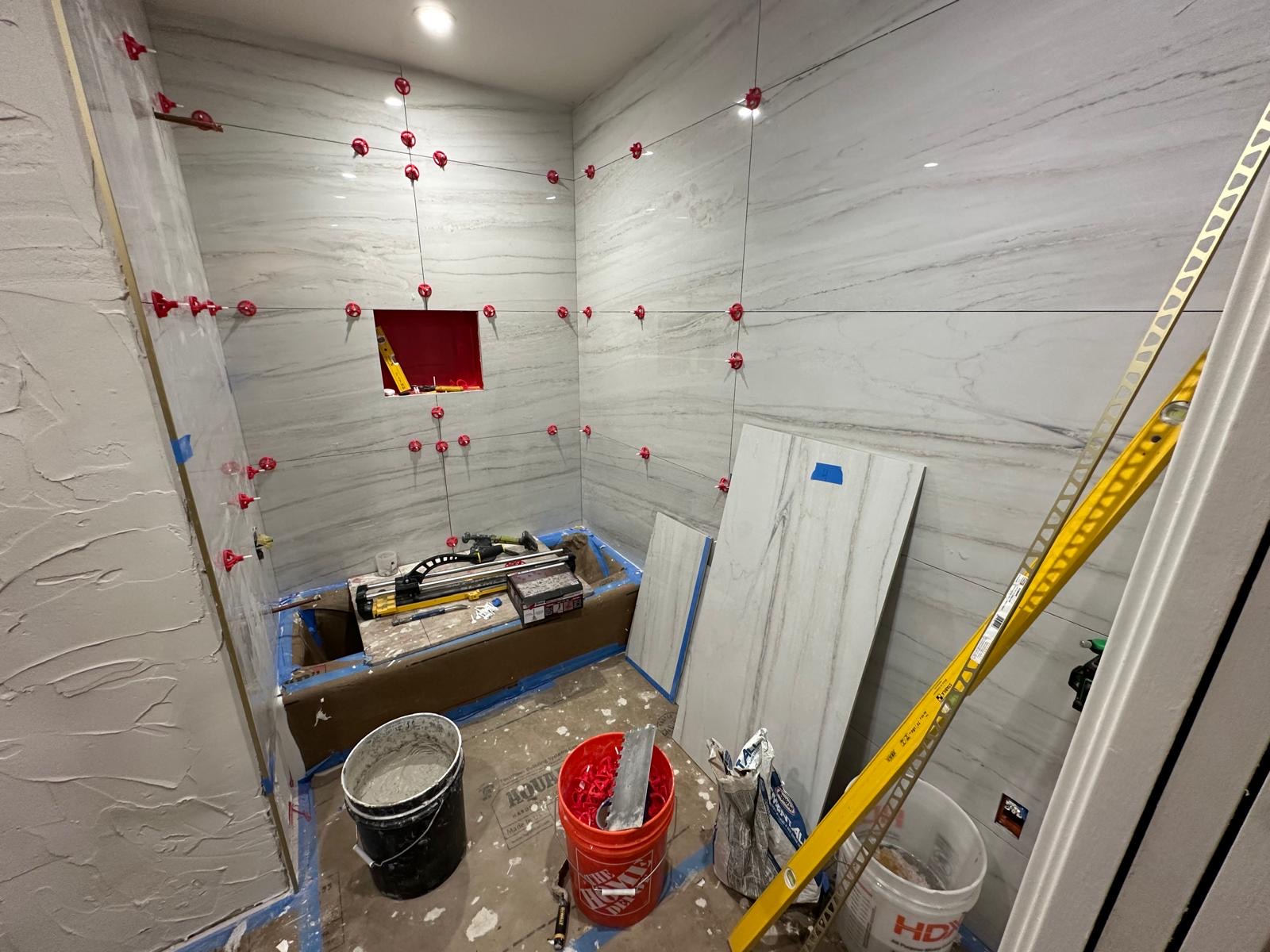 Blue Sky Plumbing bathroom remodel during tile and shower installation