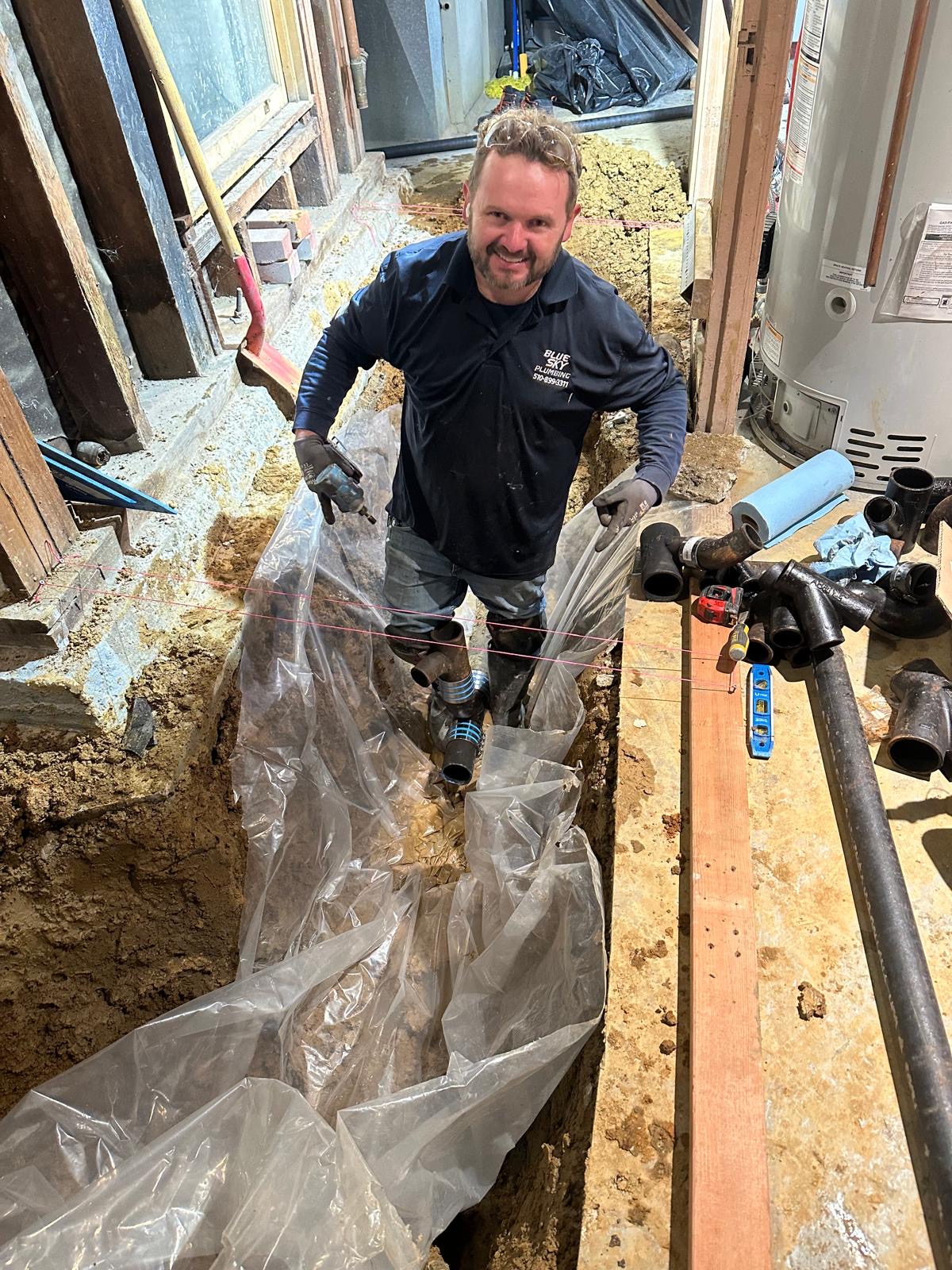 Blue Sky Plumbing technician replacing an underground sewer line